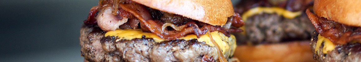 Eating American (Traditional) Burger at Country Burger restaurant in Arlington, WA.